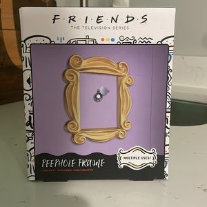 New never opened Friends peephole frame/or photo frame